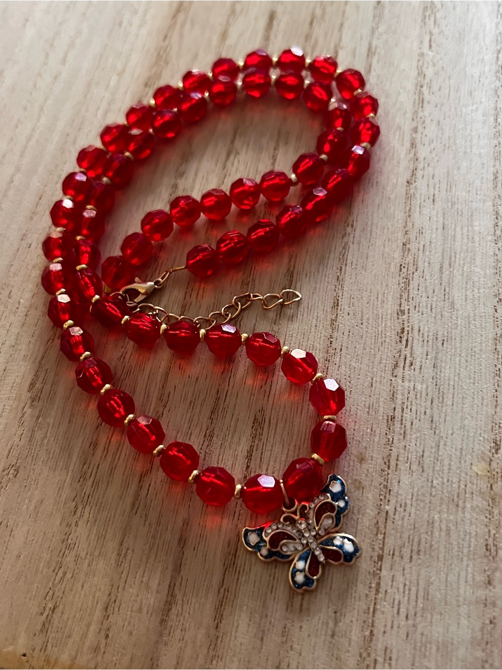 Red Beaded Necklace with Butterfly Pendant